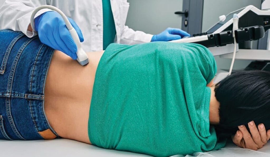 ultrasound scanning on a woman's back